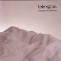TOBOGGAN / STILL GLEAMS ON HUMMOCKS