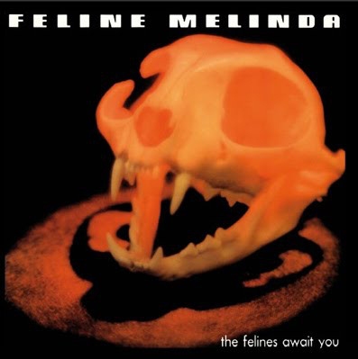 FELINE MELINDA / THE FELINES AWAIT YOU