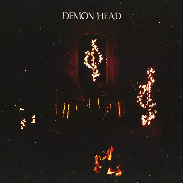 DEMON HEAD / THROUGH HOLES SHINE THE STARS